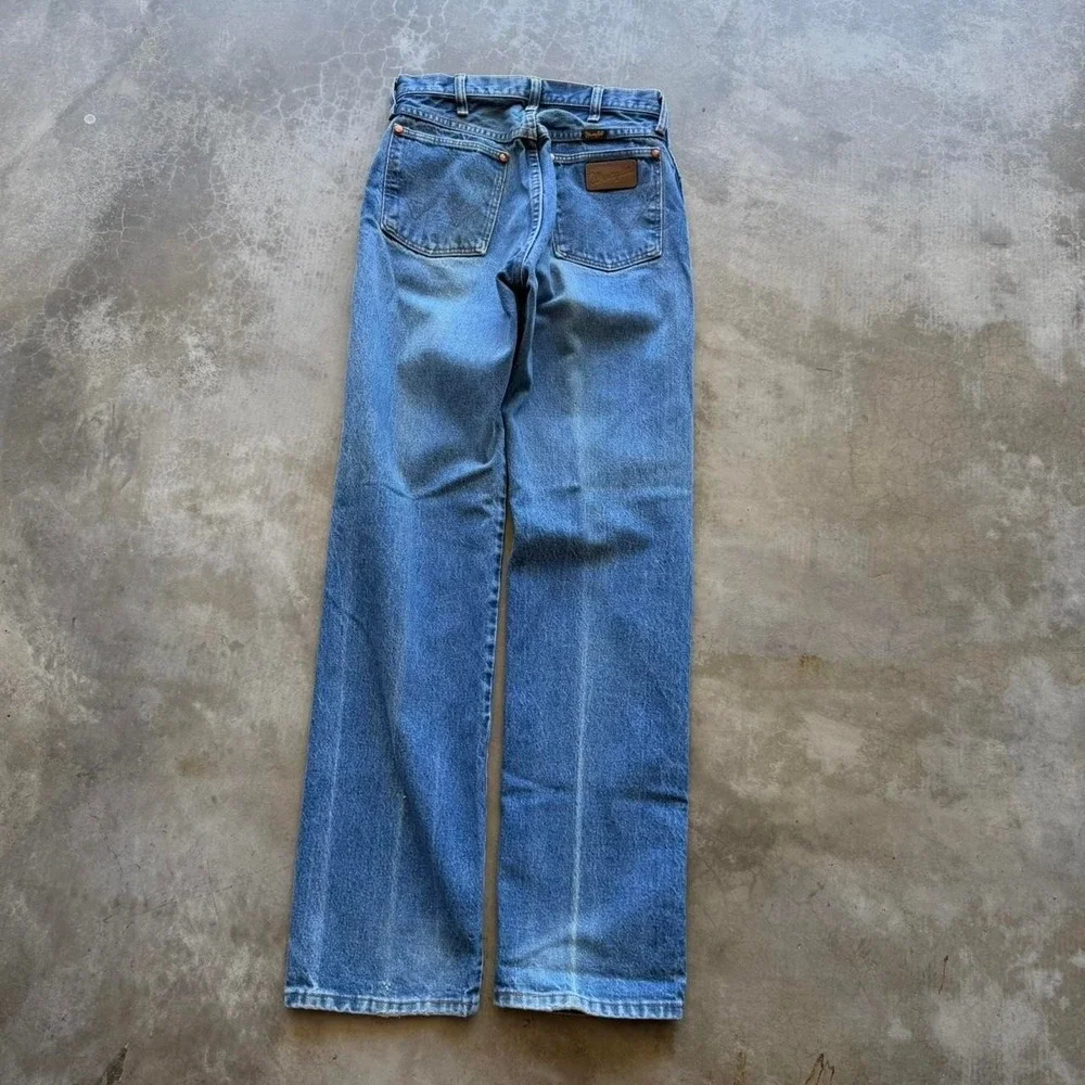 Vintage 90's Wrangler made in USA cowboy cut faded denim straight jeans 28x32